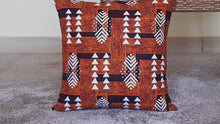 Load and play video in Gallery viewer, African Throw Pillow Cover: Orange Brown, Black and White
